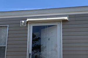 Mobile home rain diverter or drip edge.