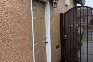 Doorbrim wall mount rain diverter above side doors.